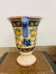 Vintage pottery vase with fruit designs