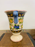 Vintage pottery vase with fruit designs