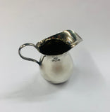 Small Sterling silver milk jug