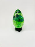 Hand Blown Green Glass egg with light Green and Black Swirls