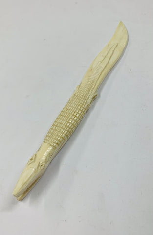 Bone letter opener shaped like a crocodile