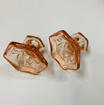 Pair of pink Depression glass candlesticks