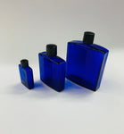 Set of 3 graduated vintage cobalt blue glass bottles