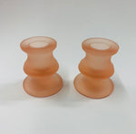 Pair of pink depression glass candlesticks