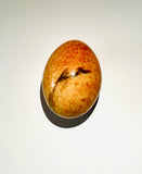 Agate Egg Orange Speckles with a Dark Streak