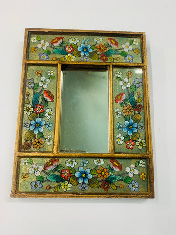 Small antique mirror with painted floral design